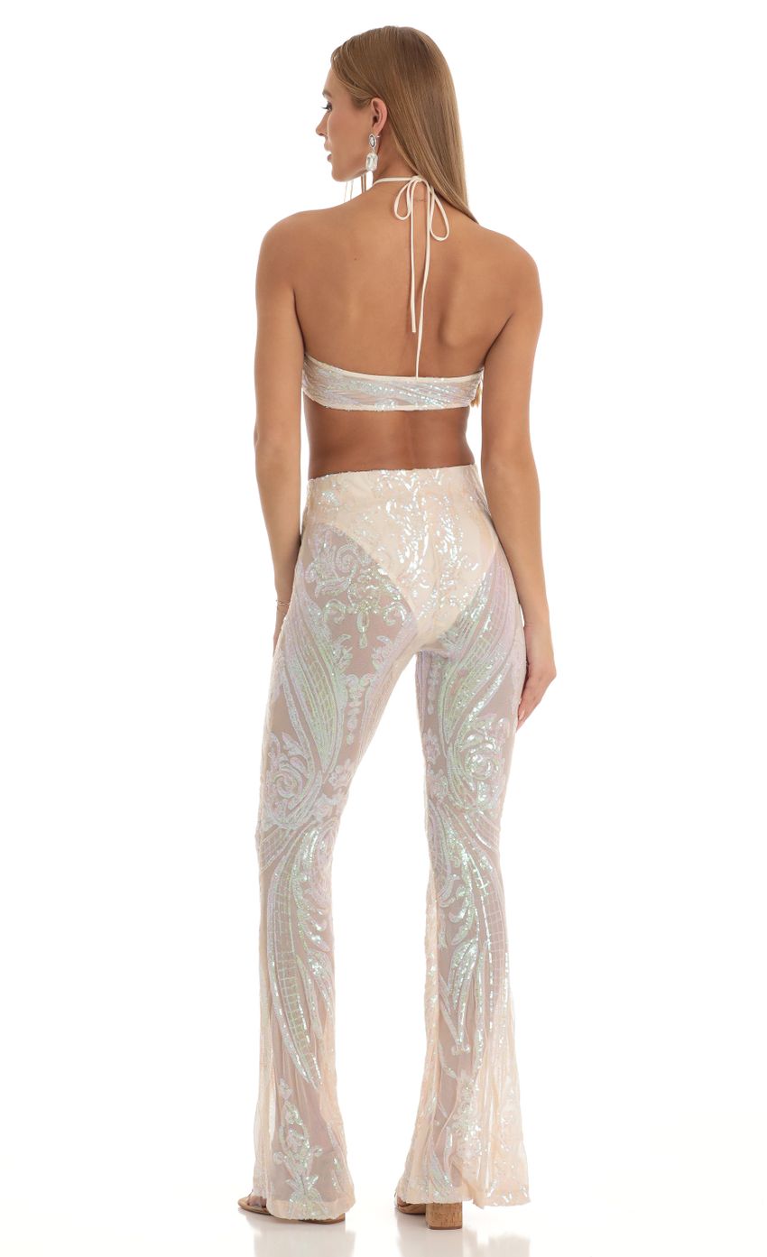 Picture Peony Iridescent Sequin Two Piece Set in Cream. Source: https://media.lucyinthesky.com/data/Jan23/850xAUTO/4eefe81a-a788-4be7-8a86-f97ff7c2bc42.jpg