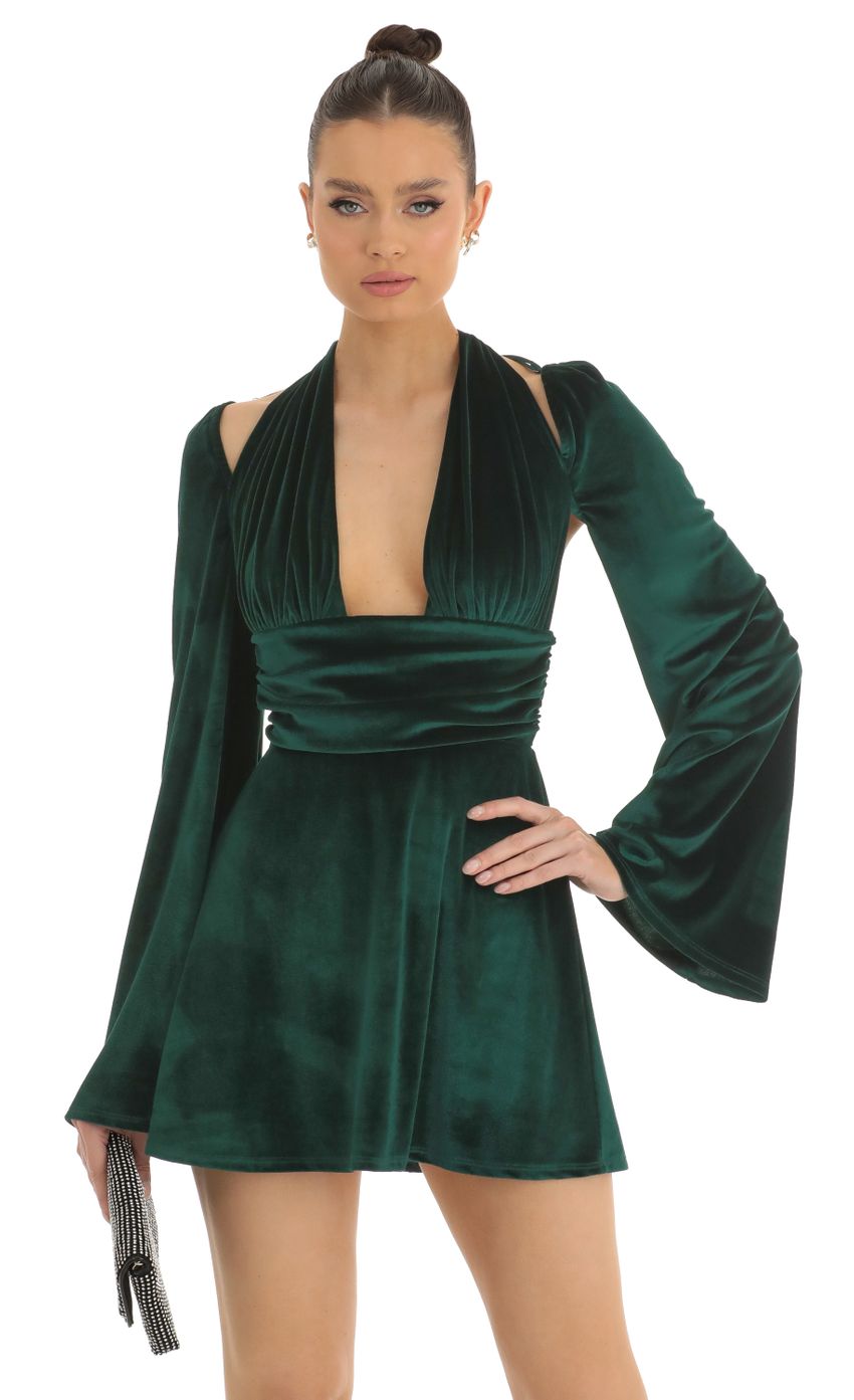 Picture Indya Velvet Cold Shoulder Plunge Dress in Dark Green. Source: https://media.lucyinthesky.com/data/Jan23/850xAUTO/50e77d1e-f54f-4c28-ad0c-f647301489ef.jpg