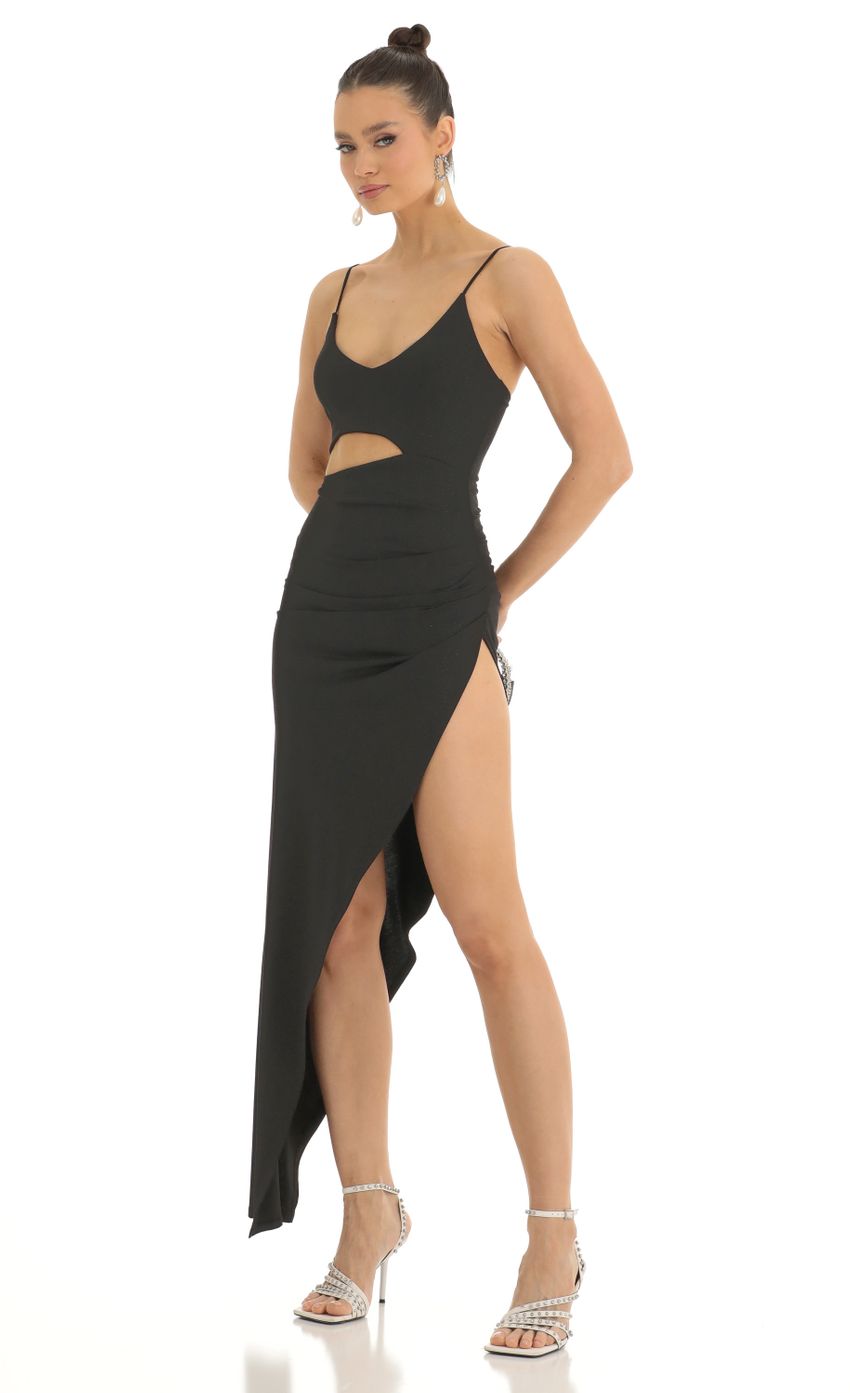 Picture Ella Glitter Cutout High Slit Maxi Dress in Black. Source: https://media.lucyinthesky.com/data/Jan23/850xAUTO/6e31b025-c462-458e-a6a0-14750ece2712.jpg