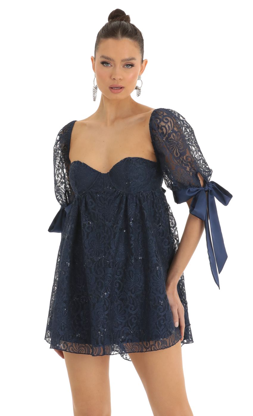 Picture Maia Sequin Lace Baby Doll Dress in Dark Blue. Source: https://media.lucyinthesky.com/data/Jan23/850xAUTO/84b1645d-181a-44ea-9ee8-7254257360cc.jpg