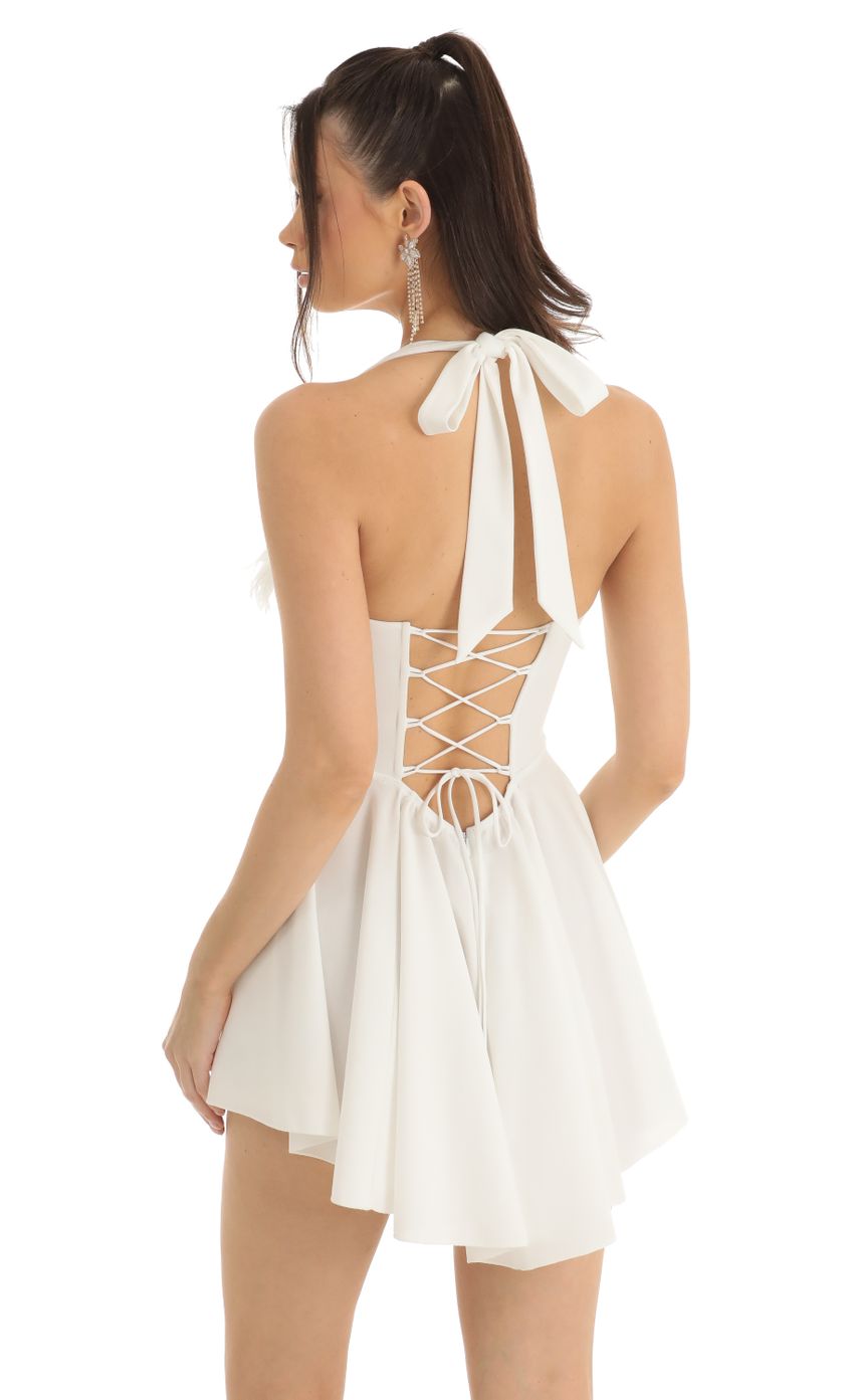 Picture Zina Crepe Corset Feather A-Line Dress in White. Source: https://media.lucyinthesky.com/data/Jan23/850xAUTO/920afa3c-7156-4435-9455-da9b963fd843.jpg