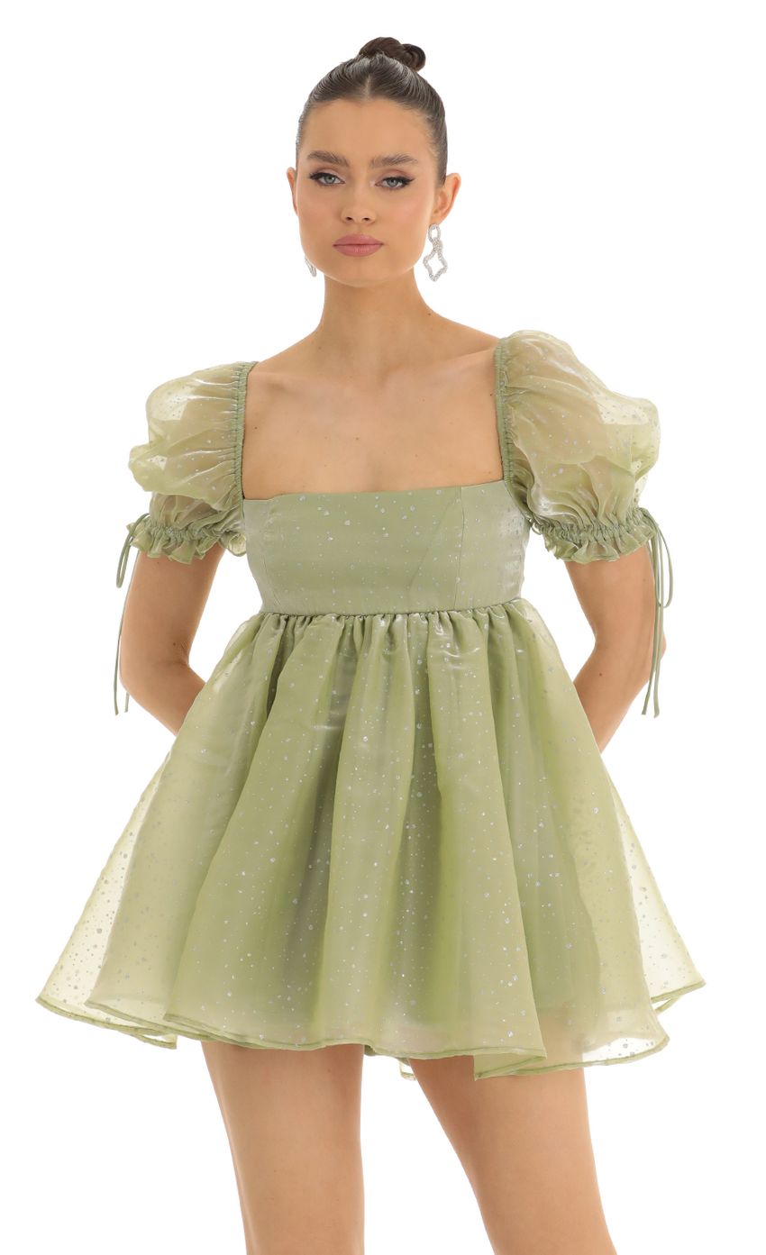 Picture Cheri Glitter Baby Doll Dress in Olive. Source: https://media.lucyinthesky.com/data/Jan23/850xAUTO/a6baf8c9-b622-4d8b-935d-3348751a0605.jpg