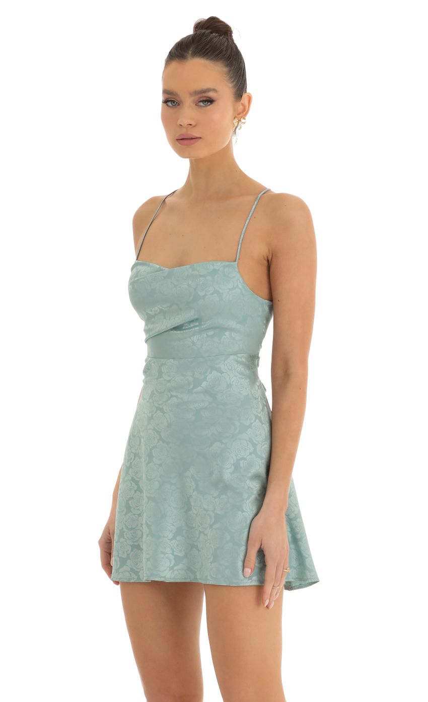 Picture Rowena Floral Jacquard A-Line Dress in Teal. Source: https://media.lucyinthesky.com/data/Jan23/850xAUTO/a8c50bee-33a2-40fc-baf0-8e3e2d0702c1.jpg