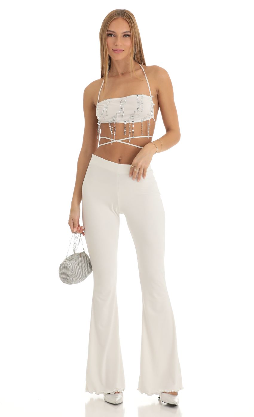 Picture Soul Sequin Two Piece Pant Set in White. Source: https://media.lucyinthesky.com/data/Jan23/850xAUTO/b22cf944-ed28-4729-8f9f-952e731b244a.jpg