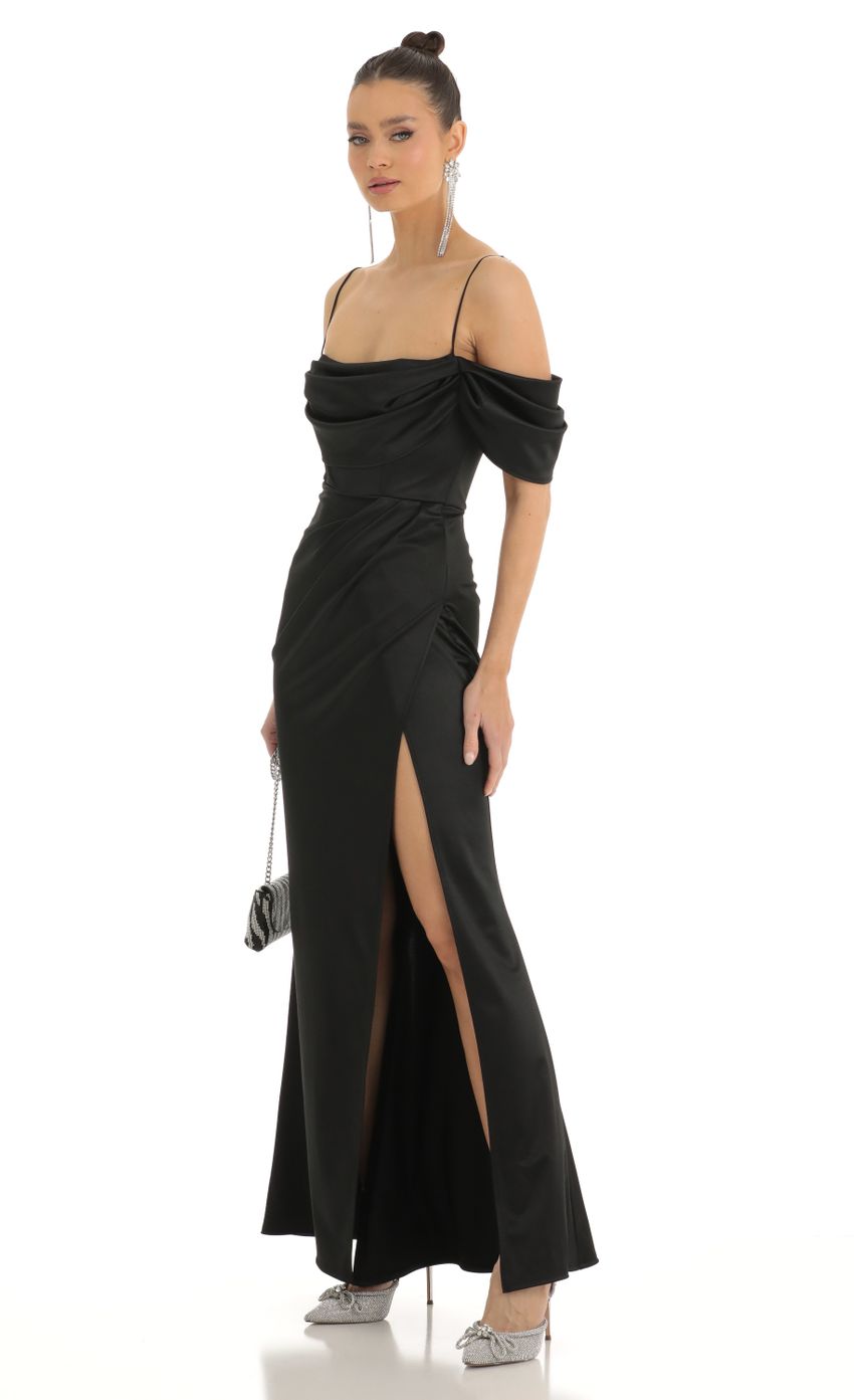 Picture Eris Satin Cowl Off Shoulder Maxi Dress in Black. Source: https://media.lucyinthesky.com/data/Jan23/850xAUTO/b41f4ac7-b209-4175-add0-a0a625bb45aa.jpg