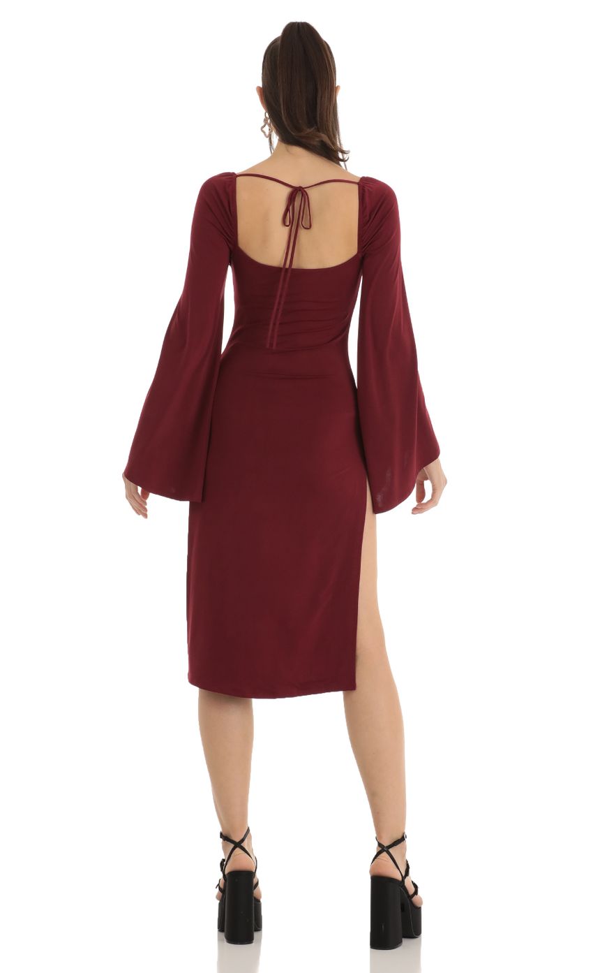 Picture Jazlyn Flare Sleeve Midi Dress in Red. Source: https://media.lucyinthesky.com/data/Jan23/850xAUTO/b6df818f-5c90-439a-a810-72f0c39872e6.jpg