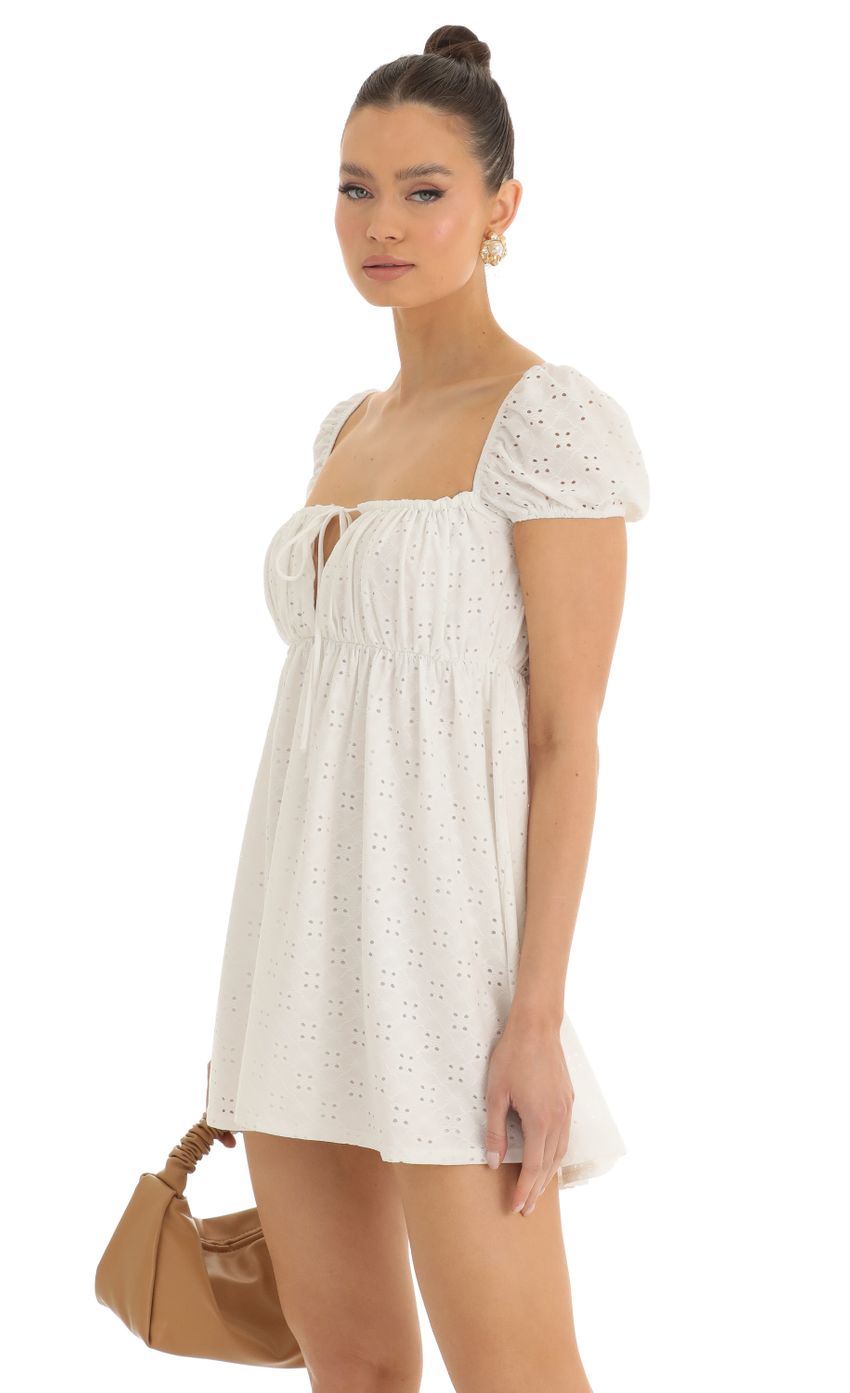 Picture Odessa Baby Doll Dress in White. Source: https://media.lucyinthesky.com/data/Jan23/850xAUTO/bf170ec2-4dcf-4c61-9991-3a4e9bfe5b73.jpg