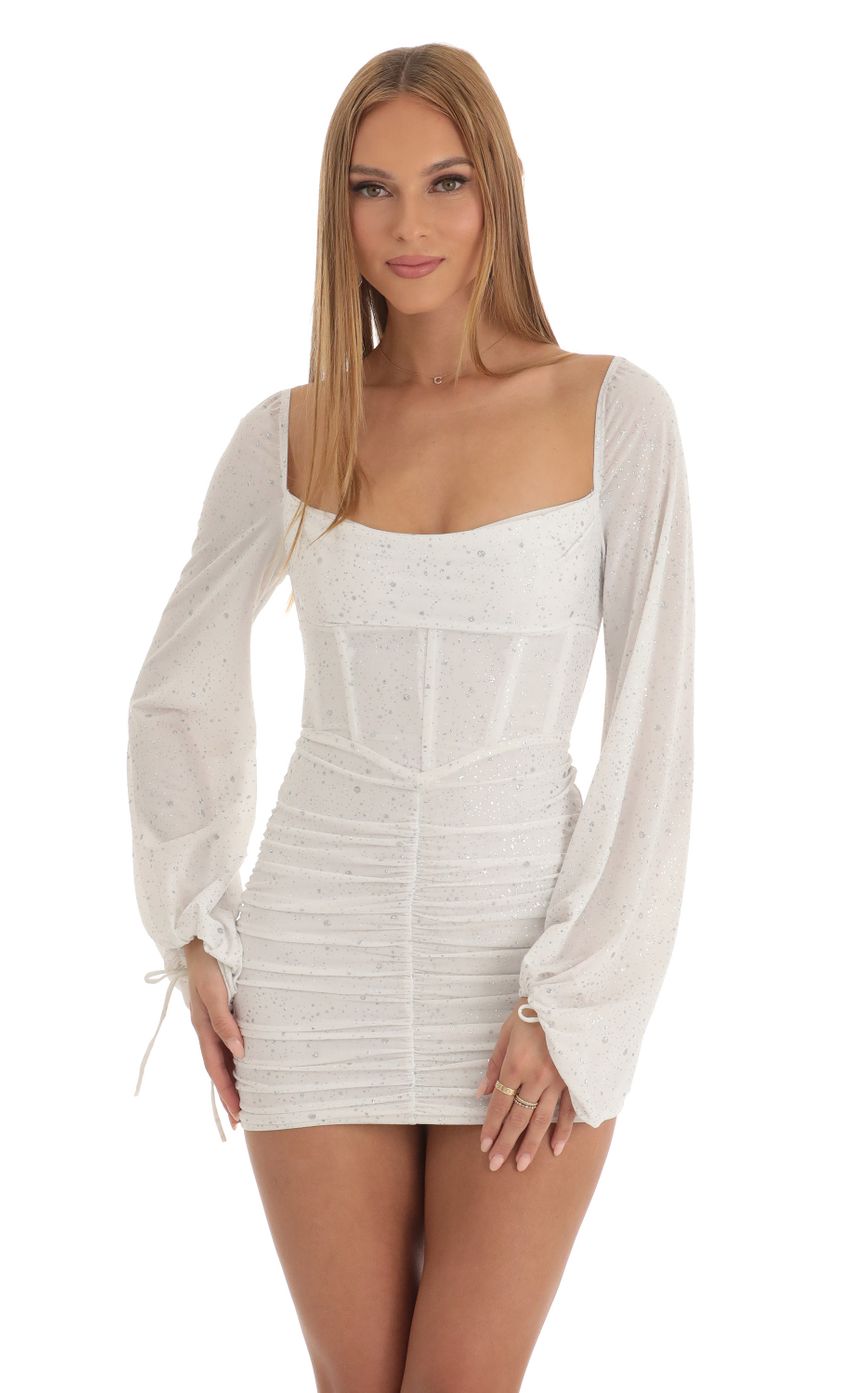 Picture Jacky Glitter Long Sleeve Corset Dress in White. Source: https://media.lucyinthesky.com/data/Jan23/850xAUTO/cf72d884-47c6-435c-82fb-dc10c2fea5dd.jpg