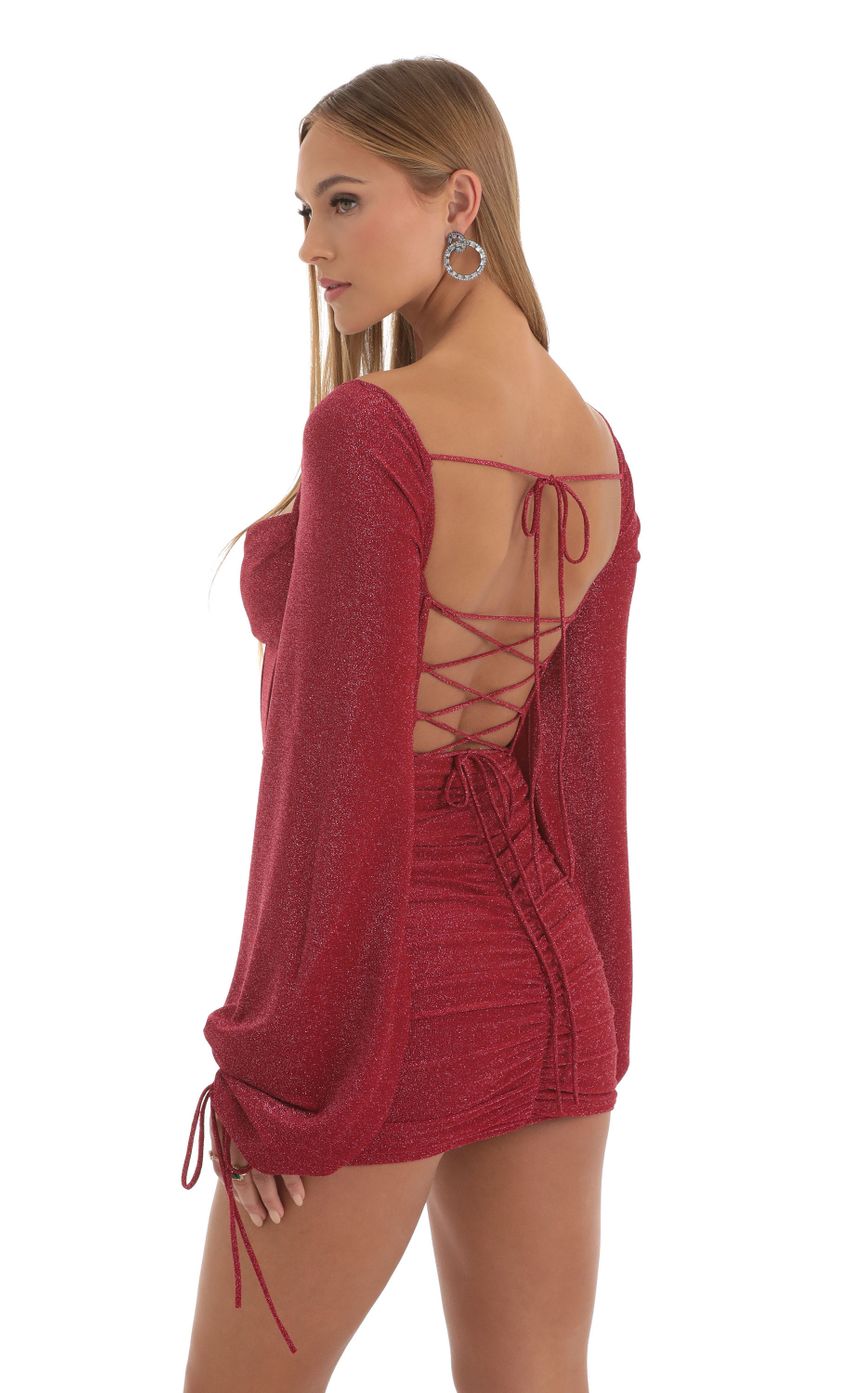 Picture Jacky Glitter Long Sleeve Corset Dress in Red. Source: https://media.lucyinthesky.com/data/Jan23/850xAUTO/d2172034-8361-4cc7-8e2a-0e6c2776c4fa.jpg