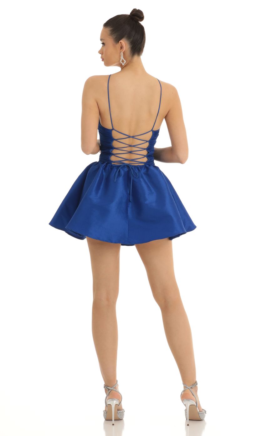 Picture Reina Satin Ruched Front Cross Dress in Blue. Source: https://media.lucyinthesky.com/data/Jan23/850xAUTO/d251a8b3-143c-45aa-bfad-a29effc59044.jpg