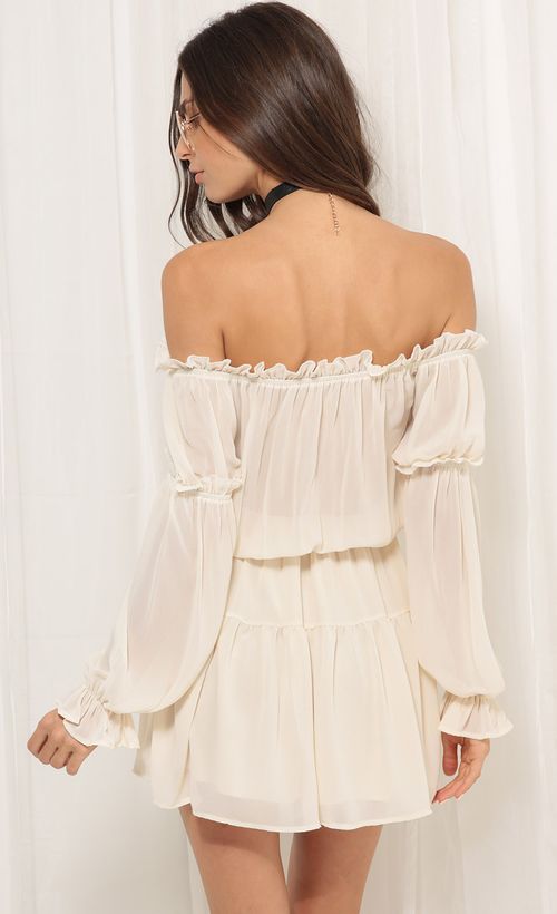 Picture Wild Thoughts Off the Shoulder Dress in Ivory. Source: https://media.lucyinthesky.com/data/Jul17_2/500xAUTO/0Y5A1632.JPG