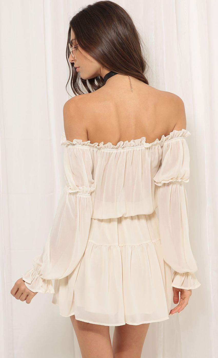 Picture Wild Thoughts Off the Shoulder Dress in Ivory. Source: https://media.lucyinthesky.com/data/Jul17_2/850xAUTO/0Y5A1632.JPG