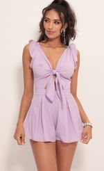 Picture Blair Front Tie Romper in Lilac. Source: https://media.lucyinthesky.com/data/Jul19_2/150xAUTO/781A0242.JPG