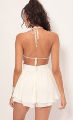 Picture Brielle Halter Chiffon Romper in Ivory Dots. Source: https://media.lucyinthesky.com/data/Jul19_2/150xAUTO/781A1248.JPG