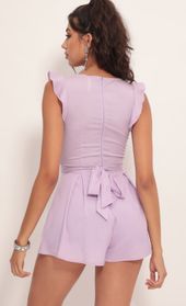 Picture thumb Blair Front Tie Romper in Lilac. Source: https://media.lucyinthesky.com/data/Jul19_2/170xAUTO/781A0266.JPG
