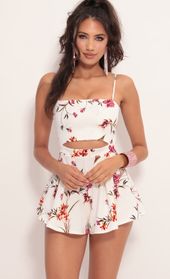 Picture thumb Juliana Cutout Romper in White Floral. Source: https://media.lucyinthesky.com/data/Jul19_2/170xAUTO/781A0879.JPG