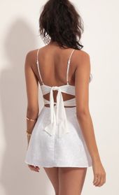 Picture thumb Olivia Floral Jacquard Mini Dress In White. Source: https://media.lucyinthesky.com/data/Jul19_2/170xAUTO/781A3765.JPG