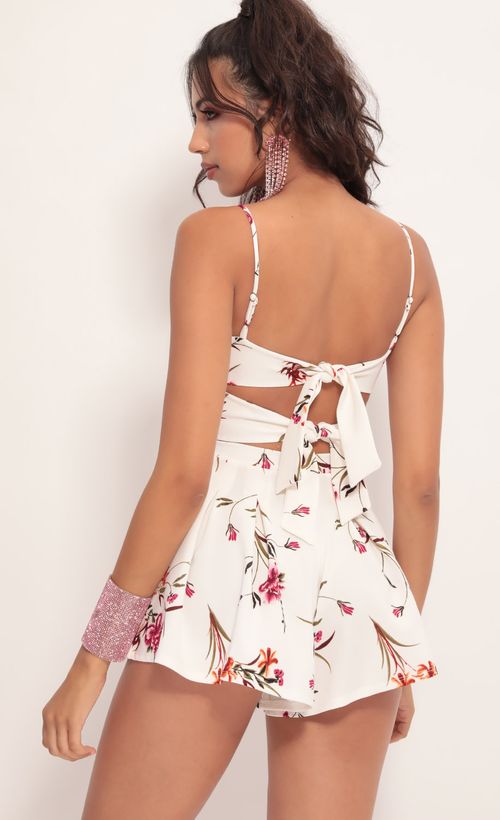 Picture Juliana Cutout Romper in White Floral. Source: https://media.lucyinthesky.com/data/Jul19_2/500xAUTO/781A0897.JPG