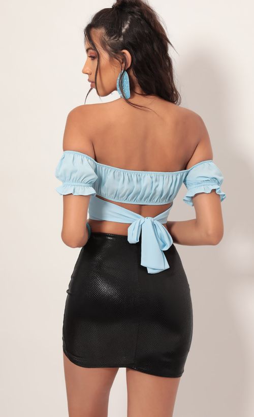 Picture Mariana Ruched Wrap Top in Sky Blue. Source: https://media.lucyinthesky.com/data/Jul19_2/500xAUTO/781A2661.JPG