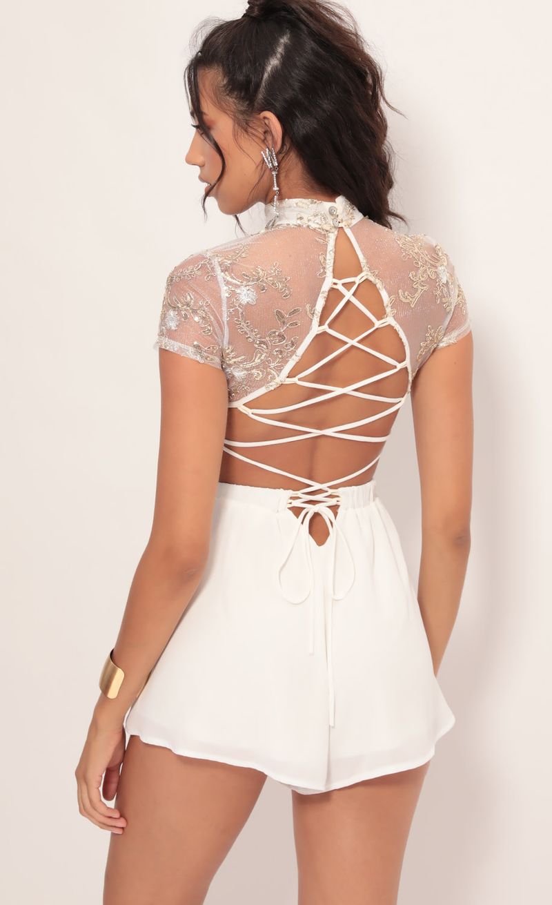 Picture Heiress Floral Lace Romper in Ivory Gold. Source: https://media.lucyinthesky.com/data/Jul19_2/800xAUTO/781A1642.JPG