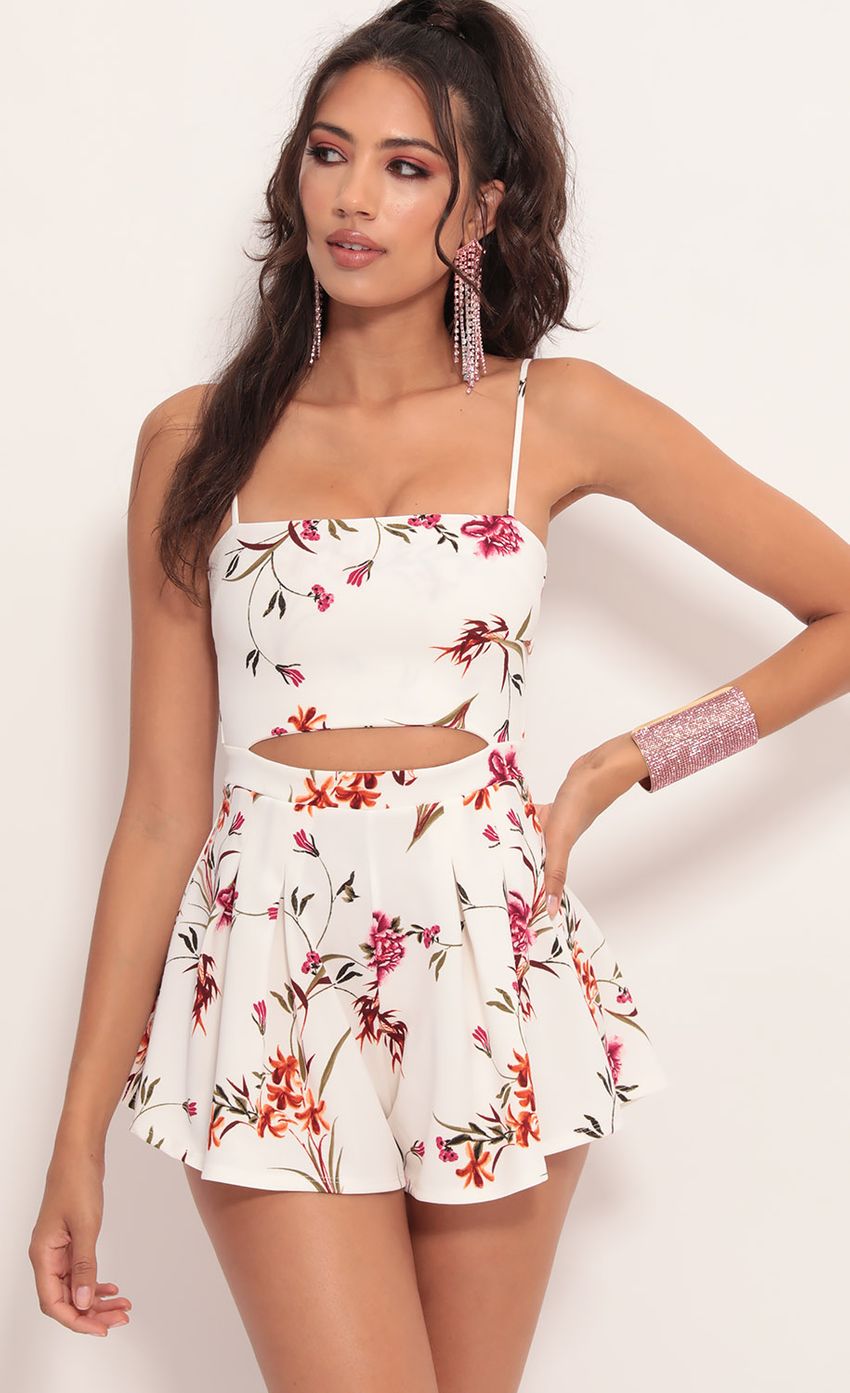 Picture Juliana Cutout Romper in White Floral. Source: https://media.lucyinthesky.com/data/Jul19_2/850xAUTO/781A0874.JPG
