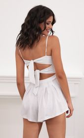 Picture thumb Juliana Cutout Romper in Silvery White. Source: https://media.lucyinthesky.com/data/Jul20_2/170xAUTO/781A5930.JPG