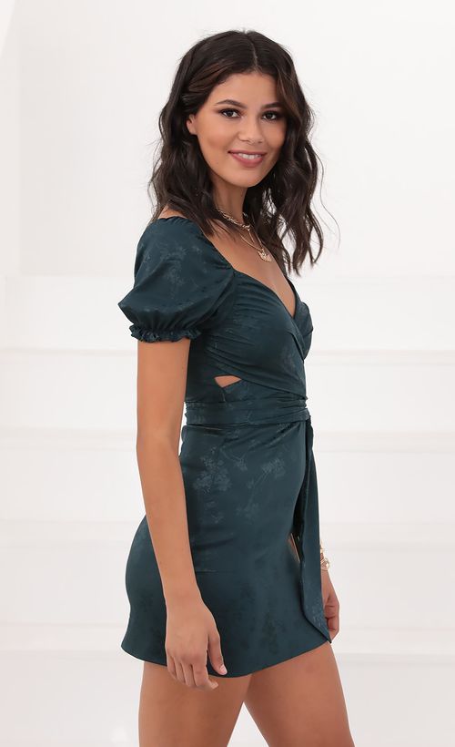 Picture Miley Puff Sleeve Wrap Dress in Green Satin and Floral. Source: https://media.lucyinthesky.com/data/Jul20_2/500xAUTO/781A1327.JPG