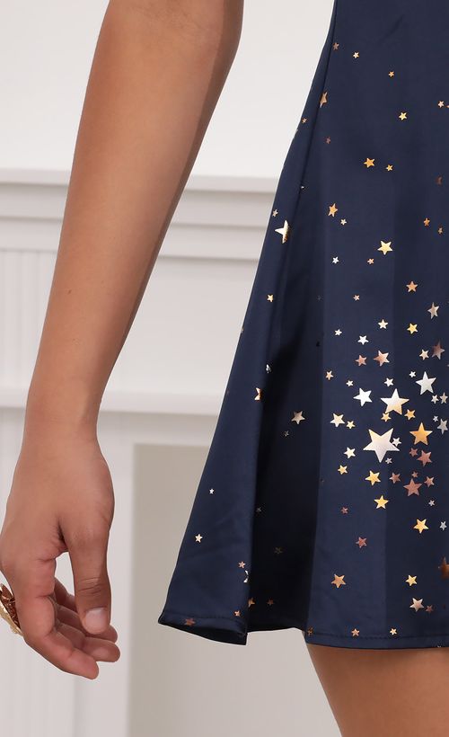 Picture Aida Puff Sleeve Dress in Midnight Satin and Stars. Source: https://media.lucyinthesky.com/data/Jul20_2/500xAUTO/781A3618.JPG