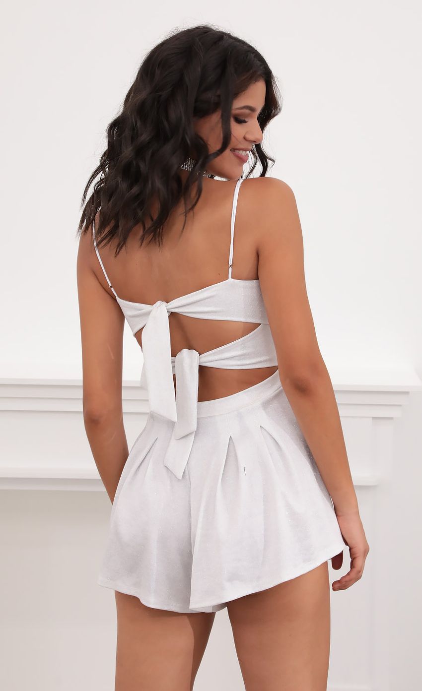 Picture Juliana Cutout Romper in Silvery White. Source: https://media.lucyinthesky.com/data/Jul20_2/850xAUTO/781A5930.JPG