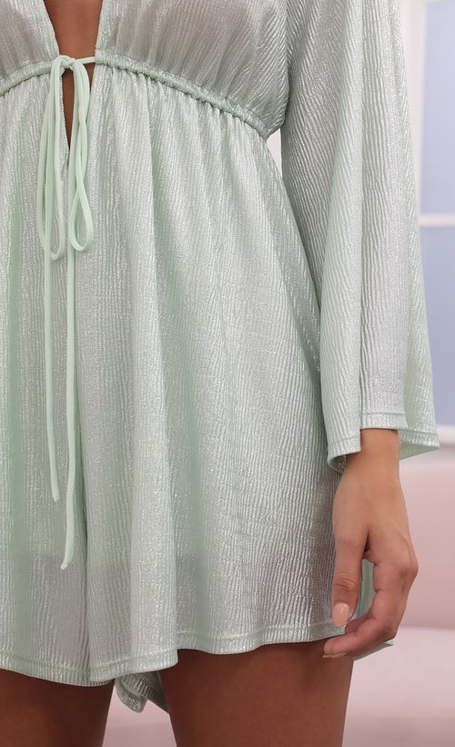 Picture Kadee Bell Sleeve Romper in Sparkle Sage. Source: https://media.lucyinthesky.com/data/Jul21_1/500xAUTO/1V9A1966.JPG