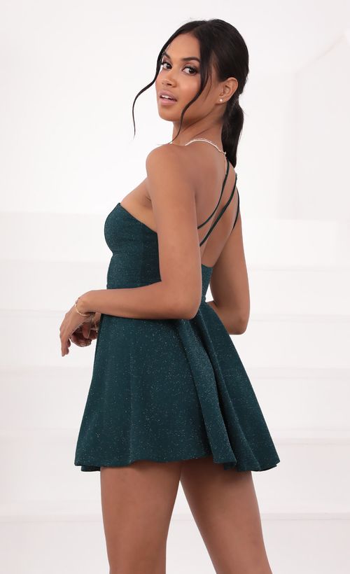 Picture Aylah One Shoulder Dress in Turquoise Sparkle. Source: https://media.lucyinthesky.com/data/Jul21_1/500xAUTO/1V9A3560.JPG