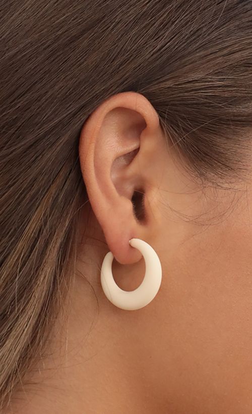Picture Puff Princess Open Hoop Earring in White. Source: https://media.lucyinthesky.com/data/Jul21_1/500xAUTO/AT2A0721.JPG