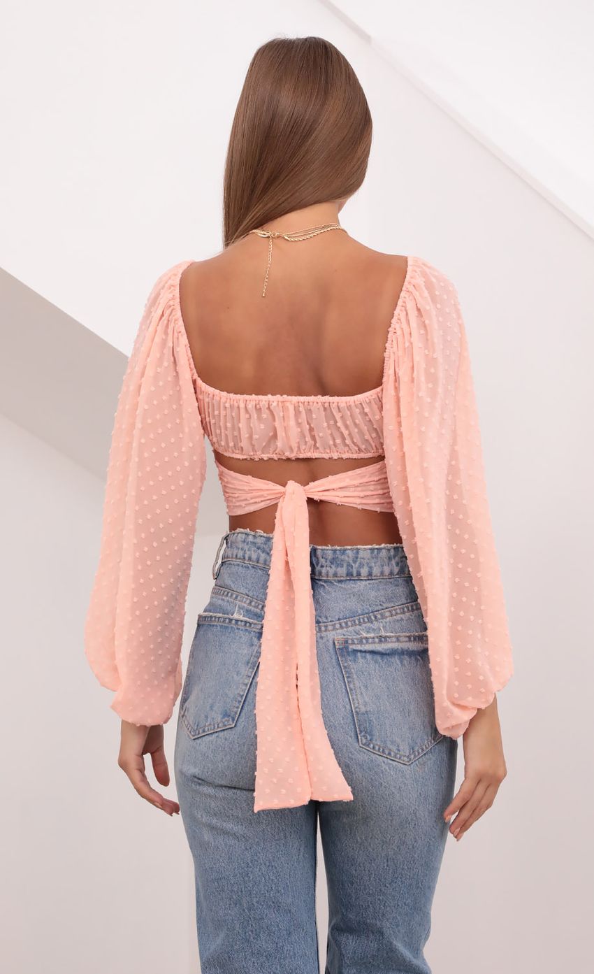 Picture Sadie Chiffon Top in Peach. Source: https://media.lucyinthesky.com/data/Jul21_1/850xAUTO/1V9A3371.JPG