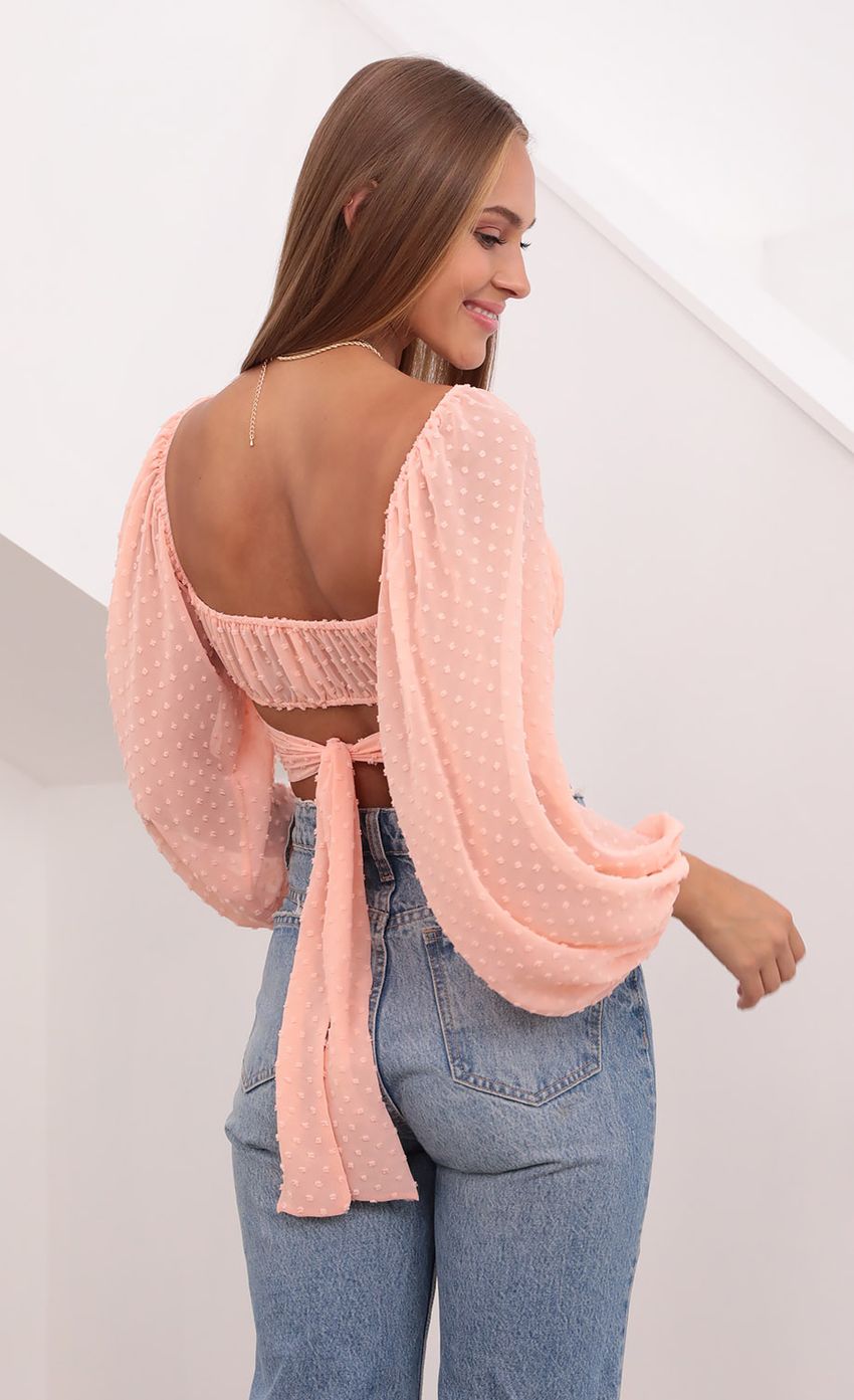 Picture Sadie Chiffon Top in Peach. Source: https://media.lucyinthesky.com/data/Jul21_1/850xAUTO/1V9A3376.JPG