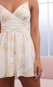 Picture thumb Eliza Chiffon A-Line Dress in White/Gold. Source: https://media.lucyinthesky.com/data/Jul21_2/170xAUTO/1V9A0646.JPG