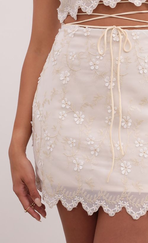 Picture Alina Floral Embroidered Halter Dress in Nude. Source: https://media.lucyinthesky.com/data/Jul21_2/500xAUTO/1V9A2014.JPG