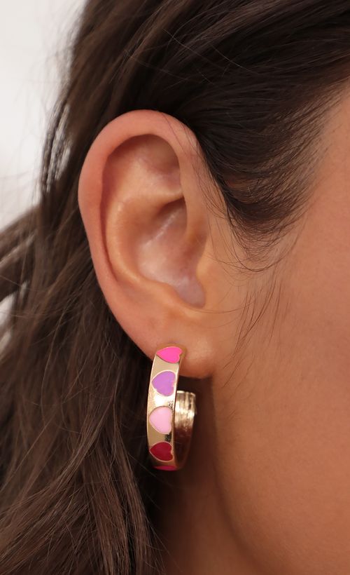 Picture Miss Valentine Flat Hoop Earrings in Gold. Source: https://media.lucyinthesky.com/data/Jul21_2/500xAUTO/AT2A8695.JPG