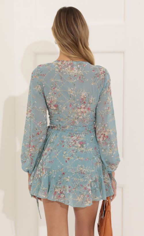 Picture Lexi Floral Ruffle Wrap Dress in Teal. Source: https://media.lucyinthesky.com/data/Jul22/500xAUTO/6dcbf03c-82b0-4b1d-a89d-9ca116e9766b.jpg