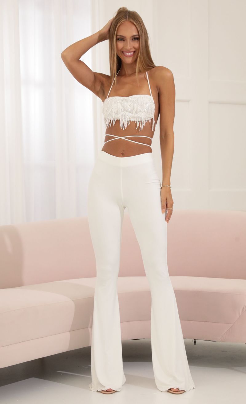 Picture Soul Sequin Two Piece Pant Set in White. Source: https://media.lucyinthesky.com/data/Jul22/800xAUTO/c61c3c73-f578-4933-b8fc-fa529864c95f.jpg