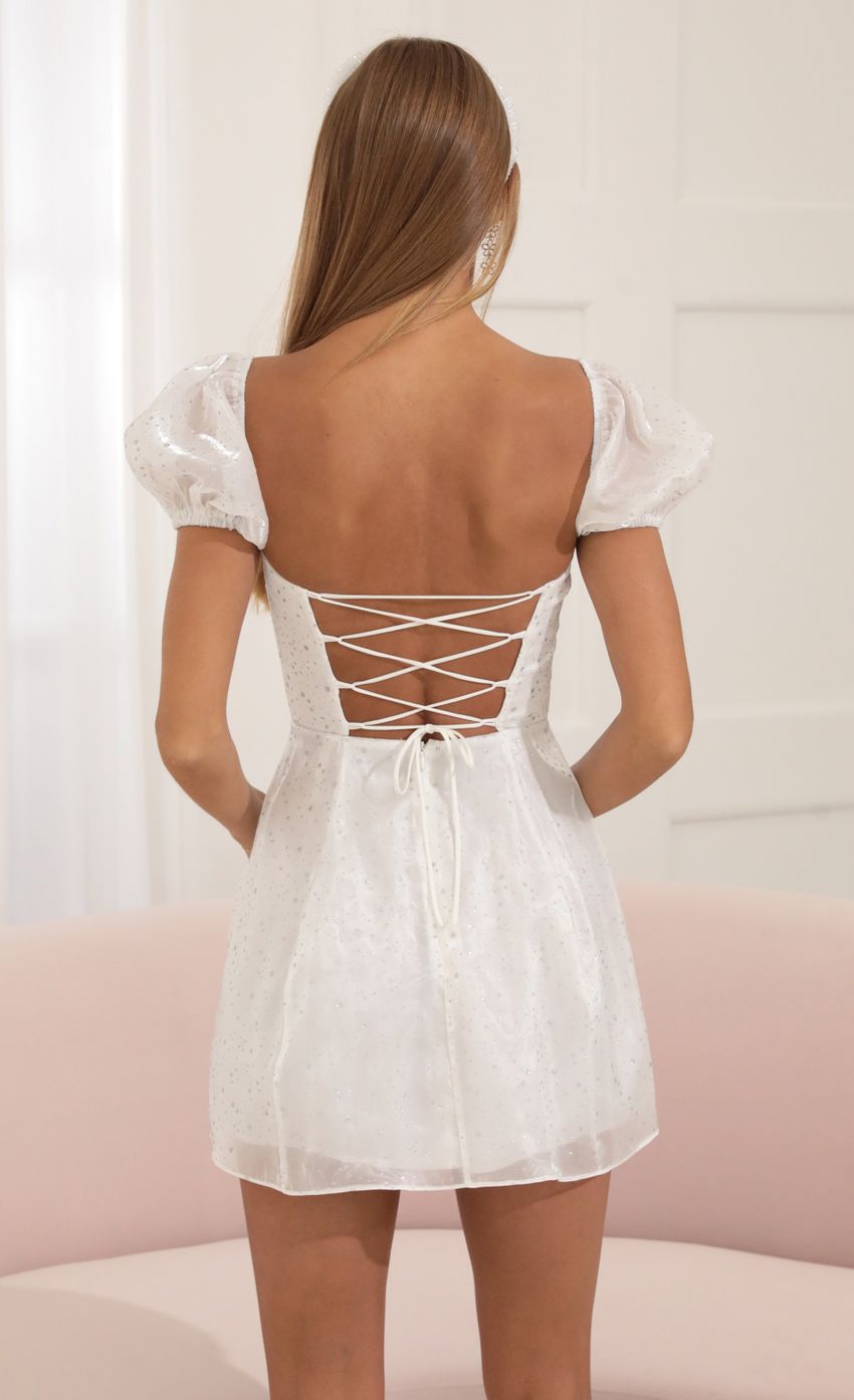 Picture Margie Glitter Puff Sleeve Dress in White. Source: https://media.lucyinthesky.com/data/Jul22/850xAUTO/5e05d94a-978e-407d-894d-849dbe51d598.jpg