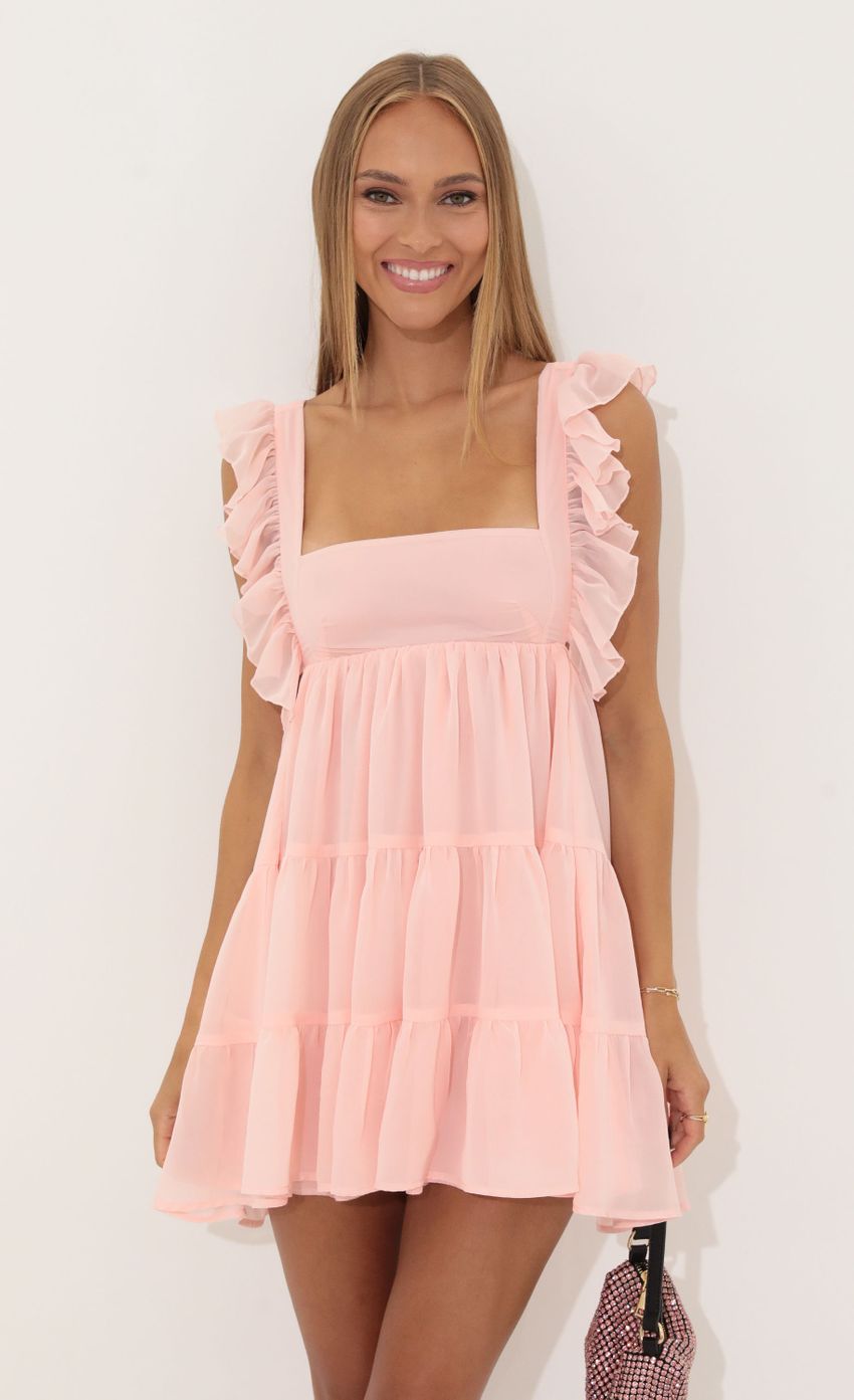 Picture Gisela Chiffon Baby Doll Ruffle Dress in Pink. Source: https://media.lucyinthesky.com/data/Jul22/850xAUTO/67551325-c3d6-4875-8bc9-4b3ff540bcc8.jpg