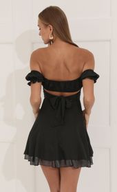 Picture thumb Estrella Metallic Ruffle Dress in Black. Source: https://media.lucyinthesky.com/data/Jul22_1/170xAUTO/1V9A4446.JPG