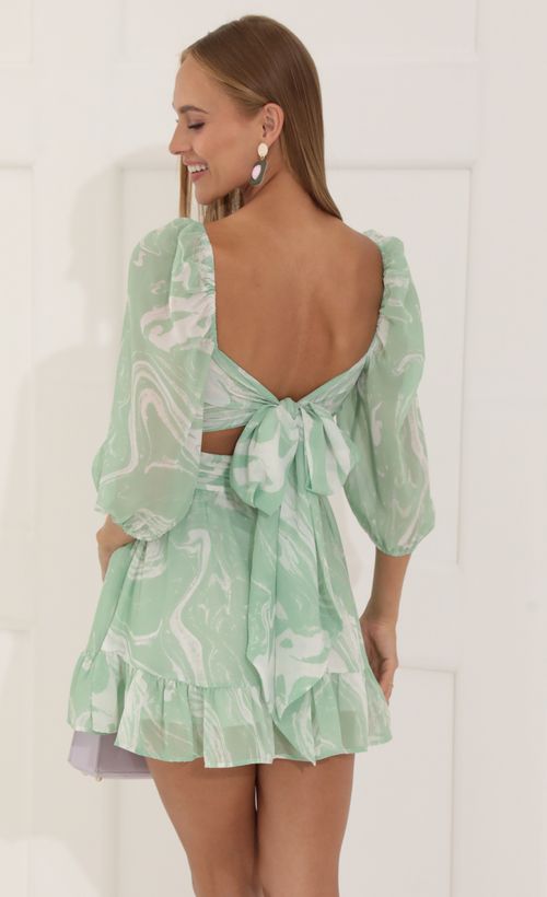 Picture Neia Ruffle Marble Chiffon Dress in Green. Source: https://media.lucyinthesky.com/data/Jul22_1/500xAUTO/1V9A8471.JPG