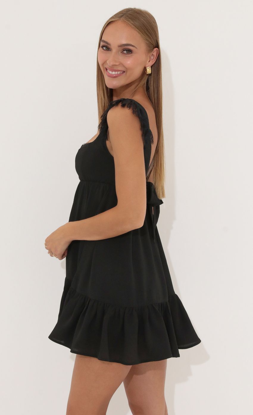Picture Michele Crepe Ruffle Baby Doll Dress in Black. Source: https://media.lucyinthesky.com/data/Jul22_1/850xAUTO/1V9A7399.JPG