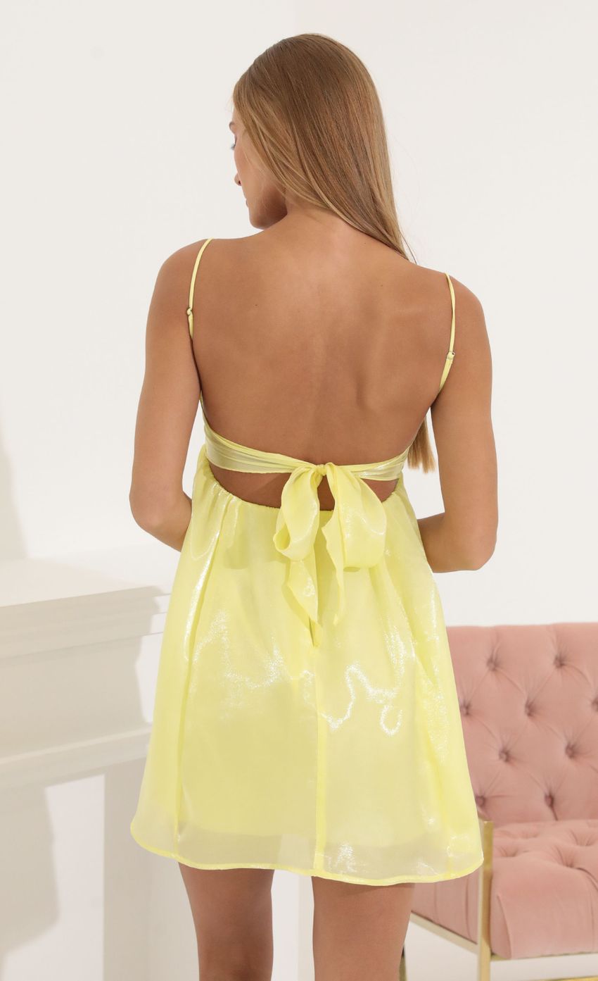 Picture Juno Shiny Organza Baby Doll Dress in Yellow. Source: https://media.lucyinthesky.com/data/Jul22_1/850xAUTO/1V9A7525.JPG