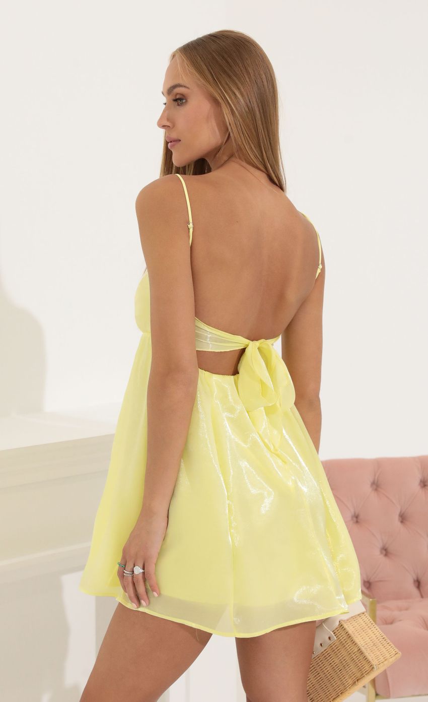 Picture Juno Shiny Organza Baby Doll Dress in Yellow. Source: https://media.lucyinthesky.com/data/Jul22_1/850xAUTO/1V9A7531.JPG