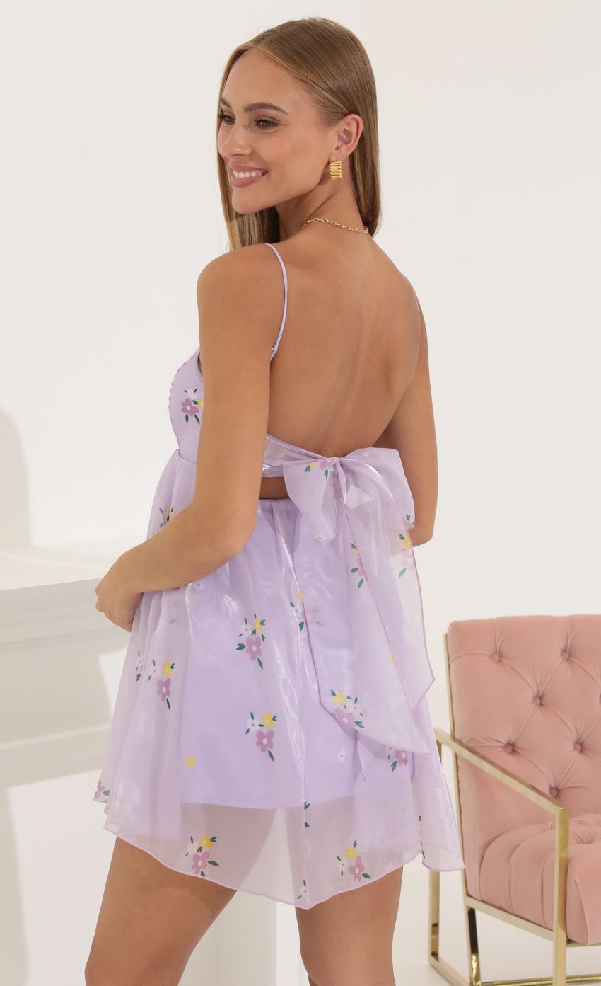 Picture Presley Floral Shiny Organza Baby Doll Dress in Purple. Source: https://media.lucyinthesky.com/data/Jul22_1/850xAUTO/1V9A8264.JPG
