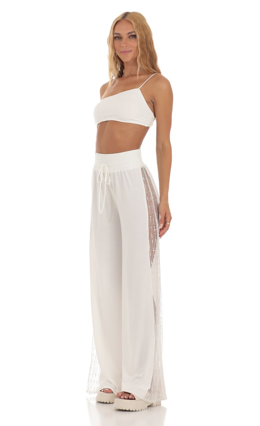 Picture Landry Sequin One Shoulder Two Piece Set in White. Source: https://media.lucyinthesky.com/data/Jul23/850xAUTO/2b444078-9bc5-4814-a76e-fade0b1c37f5.jpg