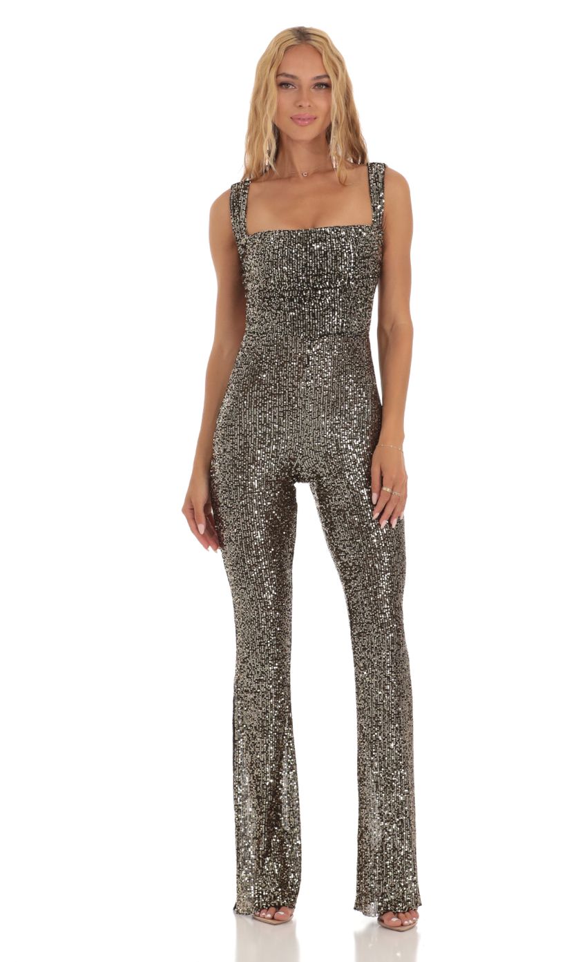 Picture Lupita Gold Sequin Back Bow Tie Jumpsuit in Black. Source: https://media.lucyinthesky.com/data/Jul23/850xAUTO/5526b216-672e-4c75-9a68-95f5d84a0964.jpg