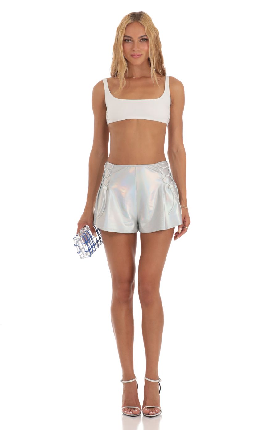 Picture Maimie Iridescent Shorts in Silver. Source: https://media.lucyinthesky.com/data/Jul23/850xAUTO/862c9d17-f003-4b46-a425-9114c77d388b.jpg